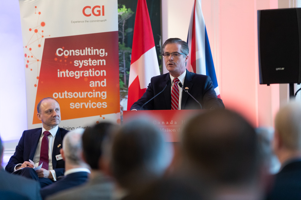Peter Hall speaking at a CGI international event